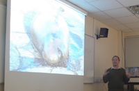 Dr. Sam Turvey and the Yangtze finless porpoise, now critically endangered and one of the species Dr. Turvey is working to protect.