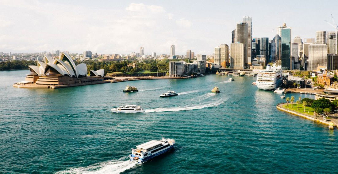 A ship sailing into Sydney harbour