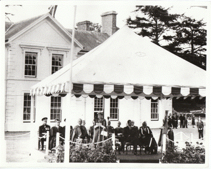 Her Majesty Queen Elizabeth II giving a speech beneath a marquee, outside Plas Gogerddan Mansion, at the official opening of the Welsh Plant Breeding Station, Plas Gogerddan, 8 August 1955. 