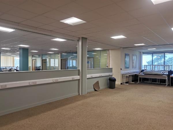 Glass fronted study rooms with light blue walls