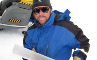 Dr Bryn Hubbard with an ice core