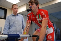 Dr Mark Burnley (left) carries out the priming warm-up technique on Gruff Lewis, who works at the University Sports Centre and is a semi-professional cyclist.