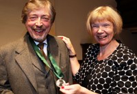 Dr David Russell Hulme receives the Glyndŵr Award from Professor April McMahon.