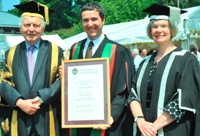 Richard Lynch (centre) with Sir Emyr Jones Parry, President of Aberystwyth University and Professor April McMahon, Vice-Chancellor