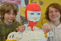 Aberystwyth Robotics Club members, Marley Plant (left) and Ferdia McKeogh, with the InMoov humanoid robot.