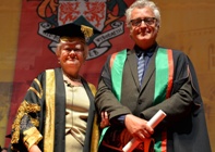 Ms Gwerfyl Pierce Jones, Vice-President of Aberystwyth University, presenting Ed Thomas as Fellow.