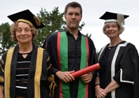 Elizabeth France, Vice-President of Aberystwyth University (left), Rhod Gilbert and Professor April McMahon, Vice-Chancellor of Aberystwyth University.