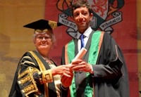 Ms Gwerfyl Pierce Jones, Vice-President of Aberystwyth University, presenting Rhodri Meilir as Fellow.