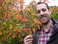 IBERS’ First Year Plant Biology student Mark Morgan, with leaves - more mobile ones just don’t get eaten.