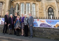 From left to right: Pro Vice-Chancellor Rhodri Llwyd Morgan, Ceredigion County Council Leader Ellen ap Gwynn, Director of Development and Alumni Relations Louise Jagger, Mary Lloyd Jones, Vice-Chancellor April McMahon, Pro-Chancellor Gwerfyl Pierce Jones and Aberystwyth Town Councillor Brendan Somers outside the Old College.