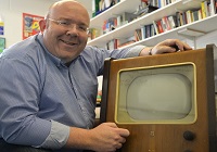 Dr Jamie Medhurst with a 1949 Philips television