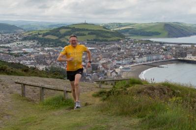 Professor John Grattan during one of his training runs up Constitution Hill in Aberystwyth.