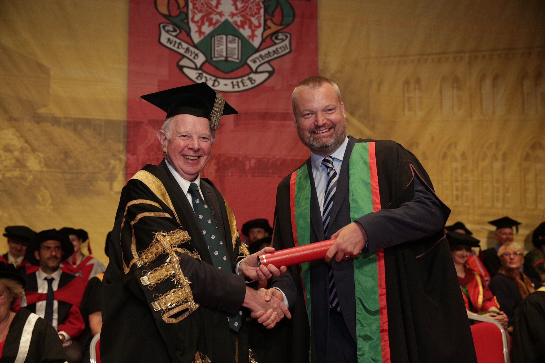 Aberystwyth University Chancellor, the Rt Hon. the Lord Thomas of Cwmgiedd with John Thompson, who received an Honorary Doctorate Degree