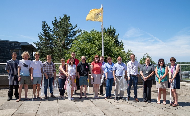 Rebecca Davies Pro Vice-Chancellor and Chief Operating Officer (right) with staff on a campus litter pick as part of Aberystwyth University’s Plastic Free Day held in June 2018.
