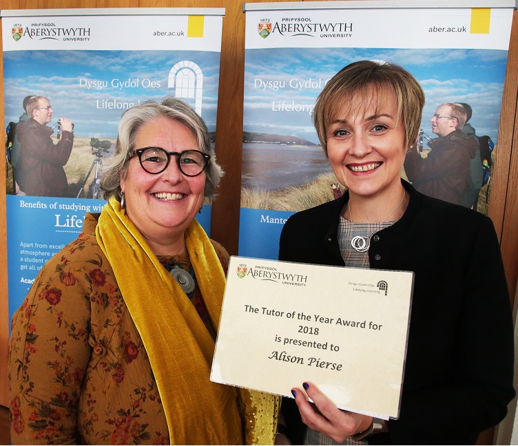 Alison Pierse (left) joint winner of the Lifelong Learning Tutor of the Year Award with Elen James, Corporate Lead Officer for Lifelong Learning and Culture at Ceredigion County Council, and Chair of Ceredigion Adult Community Learning Partnership.