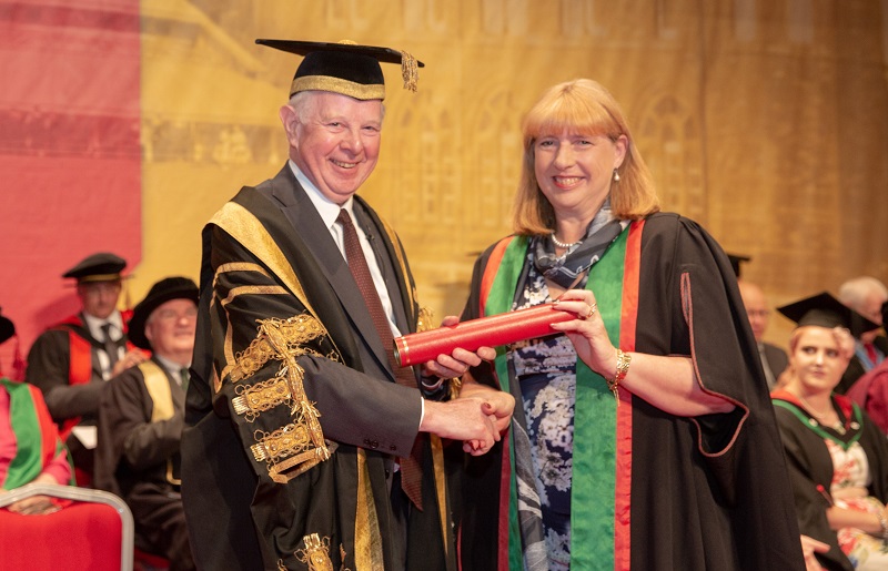 The Chancellor of Aberystwyth University, Lord Thomas of Cwmgïedd, presenting Professor Ann Sumner as Fellow during Graduation 2018.