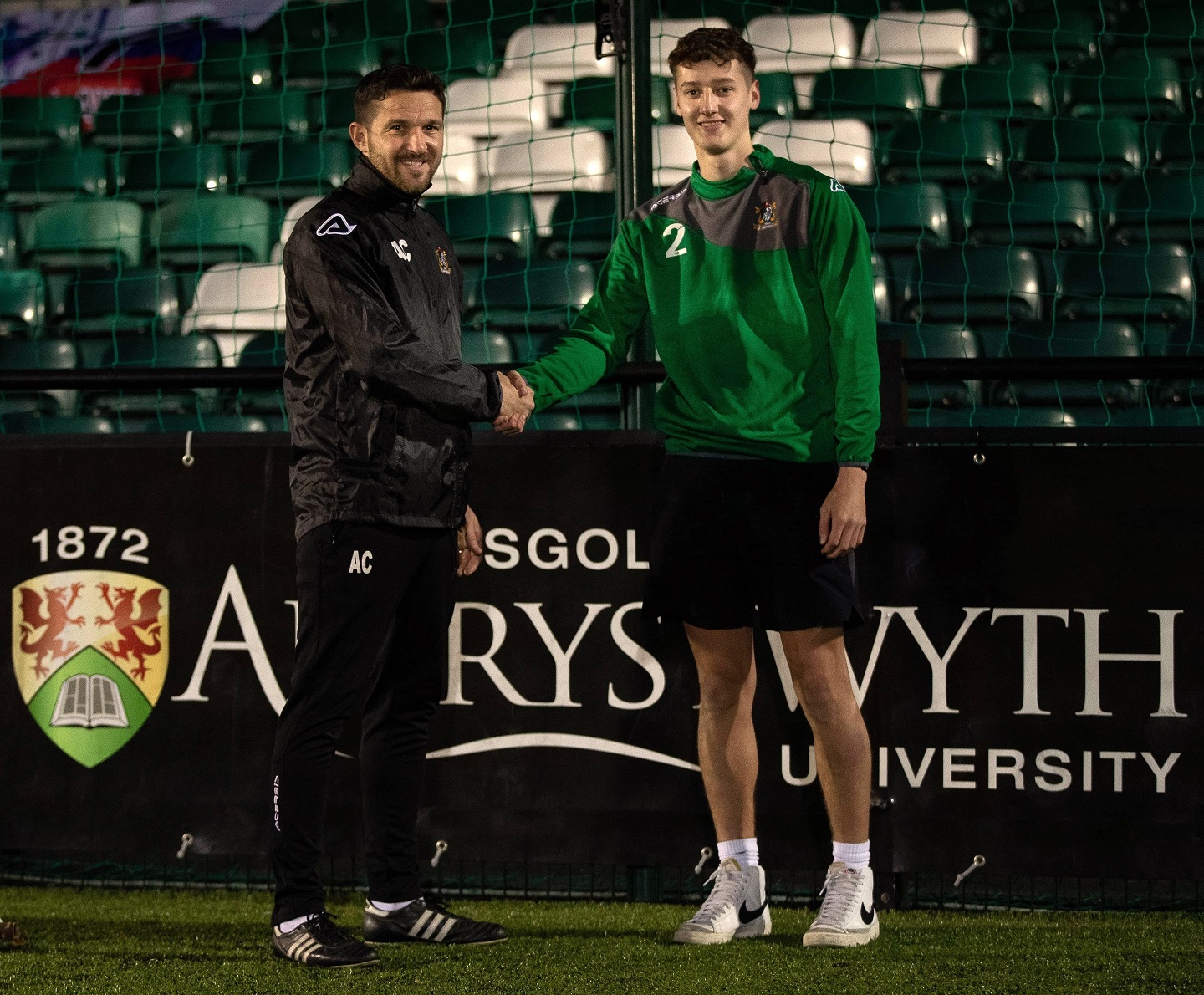 Aberystwyth Town Football Club first team manager Antonio Corbisiero (left) with Aberystwyth University and Aberystwyth Town Football Club Scholarship holder, Kieran Booker