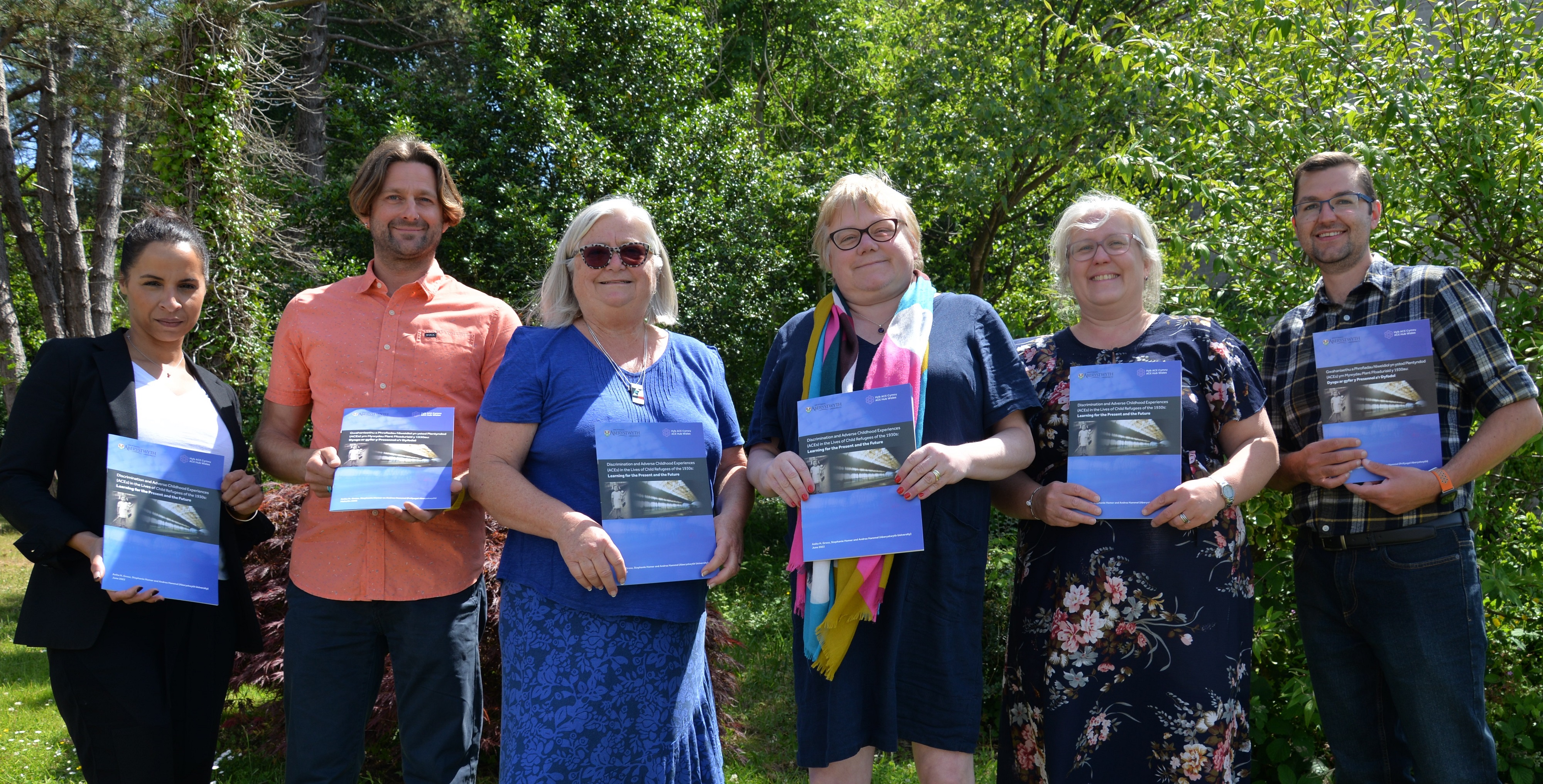 Left to right, photographed at the launch of the report: Emma Wools, Deputy Police and Crime Commissioner for South Wales; Mark Jones, Director of Higher Plain Research & Education; Anita H. Grosz, Aberystwyth University; Dr Andrea Hammel, Aberystwyth University; Joanne Hopkins, Programme Director for Adverse Childhood Experiences (ACEs), Criminal Justice and Violence Prevention, Public Health Wales; and John Davies, Head of Inclusion and Cohesion, Welsh Government