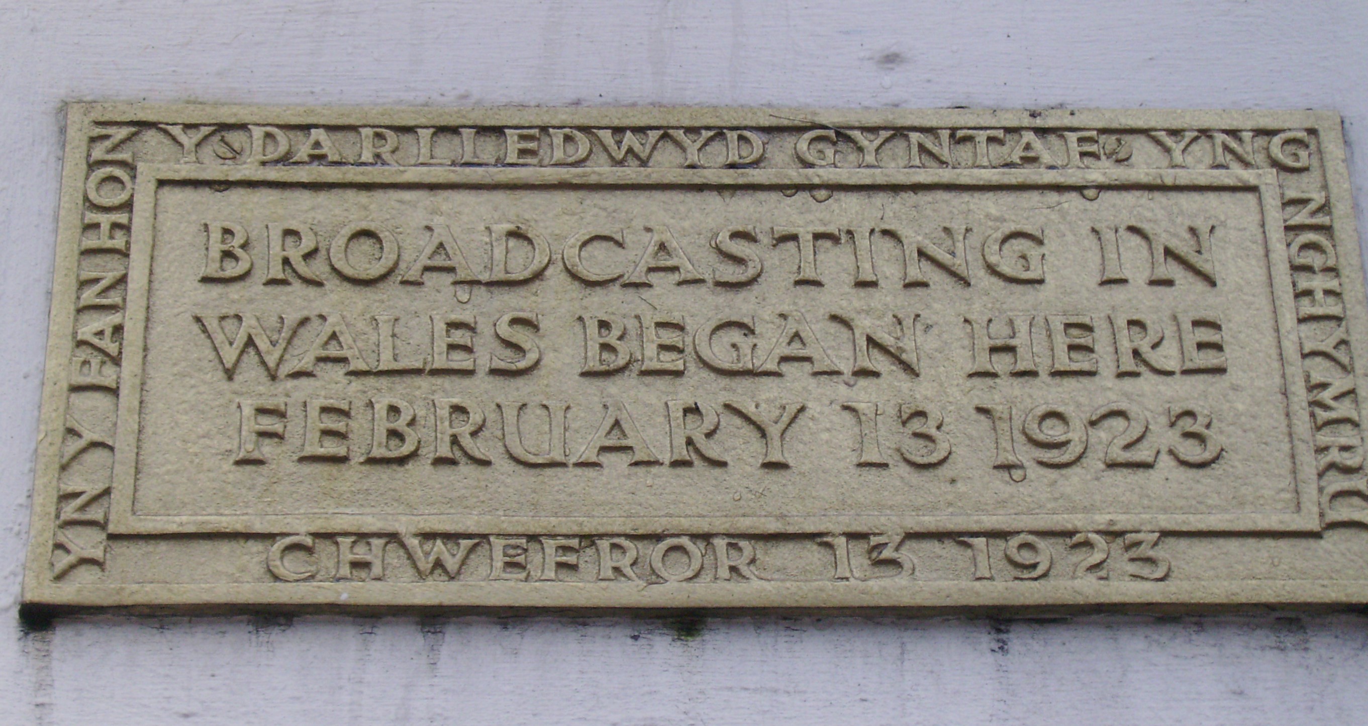Plaque commemorating the first BBC broadcast in Wales at 19 Castle Street, Cardiff. Credit: Seth Whales