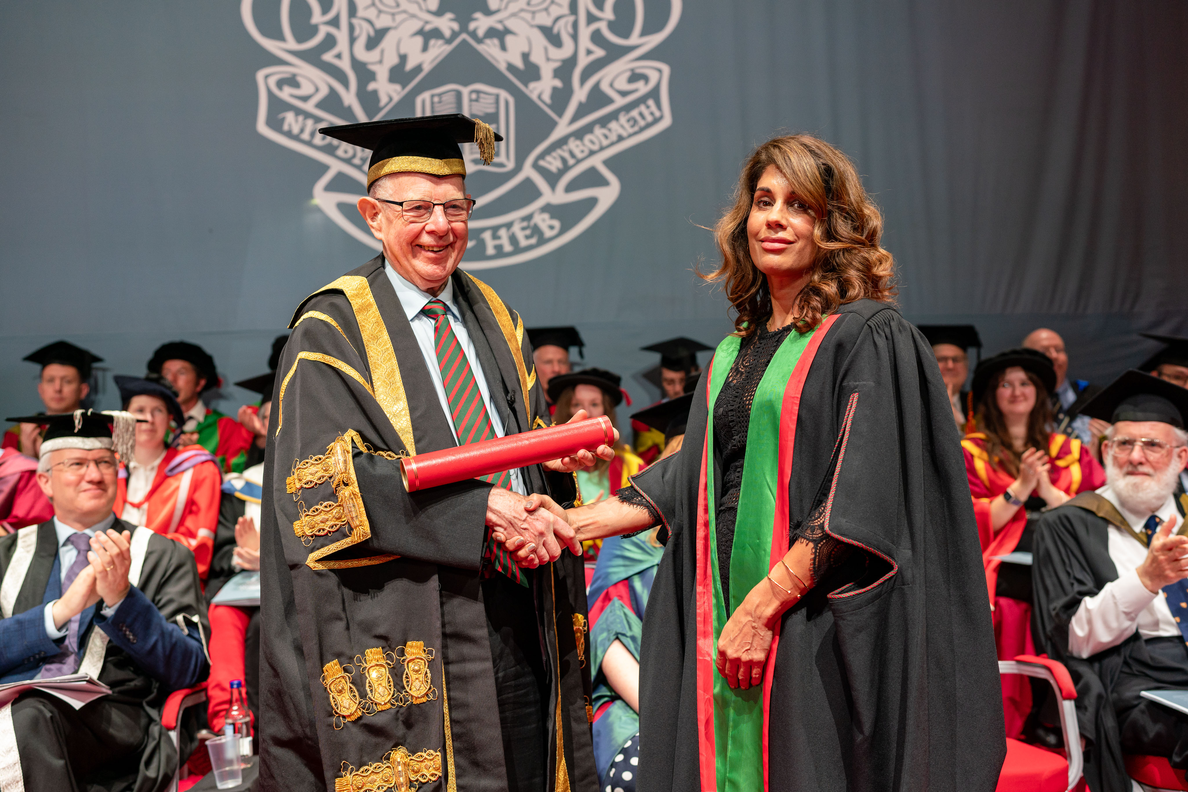 Rt Hon Lord Thomas of Cwmgïedd, Chancellor of Aberystwyth University, presenting Dr Anna Persaud as Honorary Fellow