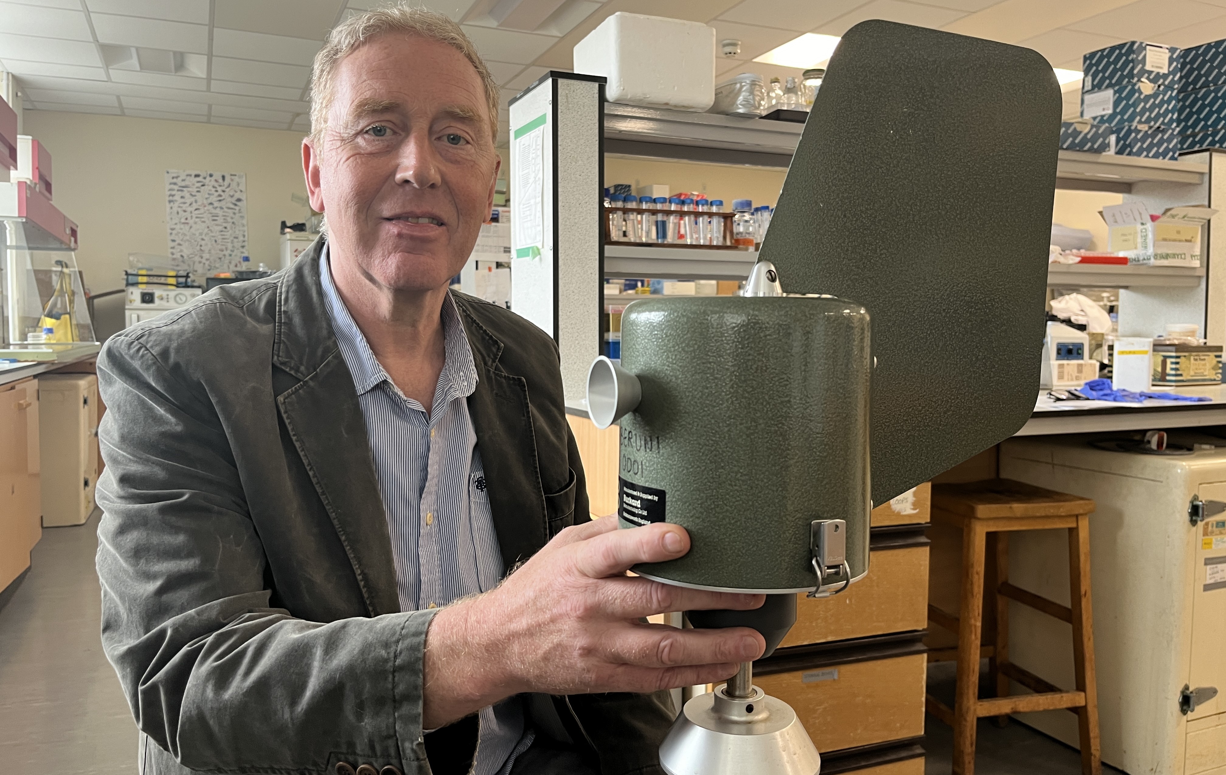 Professor Gareth Griffith with one of the air sampling machines