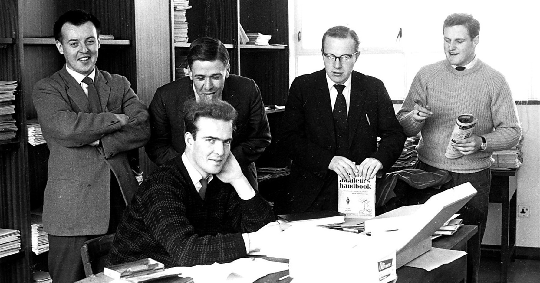 Dr Rhidian Lawrence (left) during his days as a PhD student in the Physics Department at Aberystwyth University. Also pictured are Bryn Price (seated) and standing left to right, Emyr Evans, Emyr Winstanley and Dan Rees.