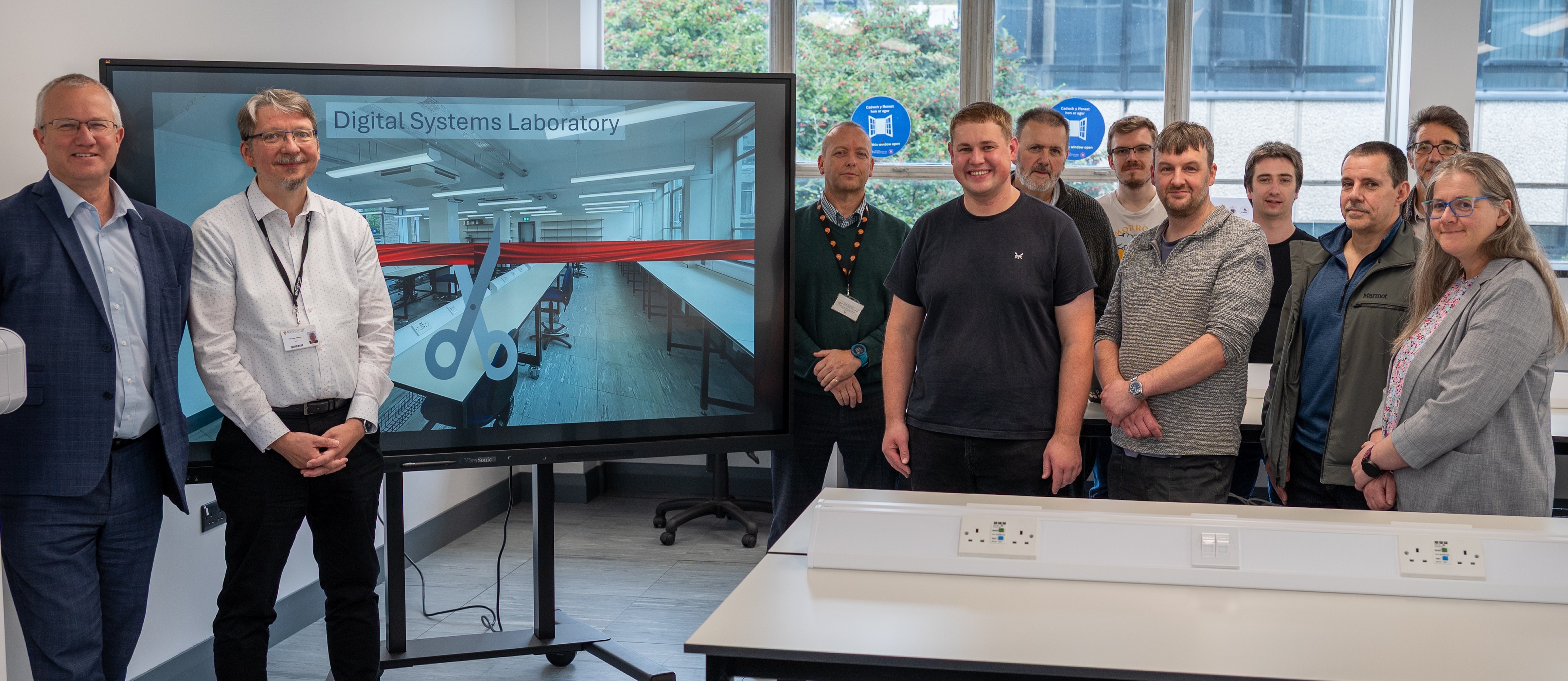 Aberystwyth University Vice Chancellor, Professor Jon Timmis and Head of the Department of Computer Science, Dr Thomas Jansen, with architects and University staff involved in the refurbishment project.