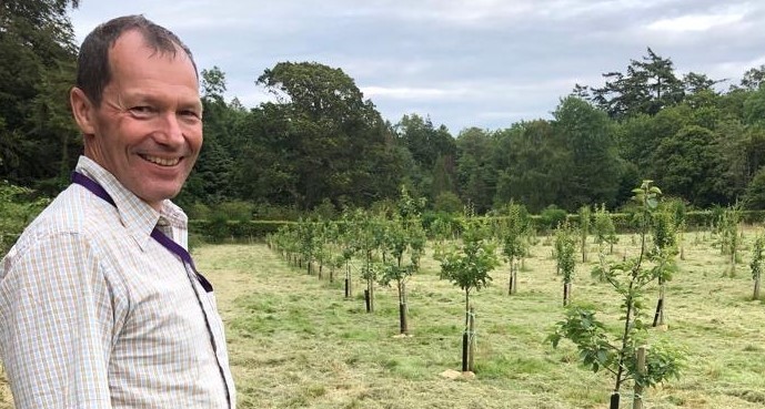 Dr Danny Thorogood at the heritage orchard, IBERS Gogerddan