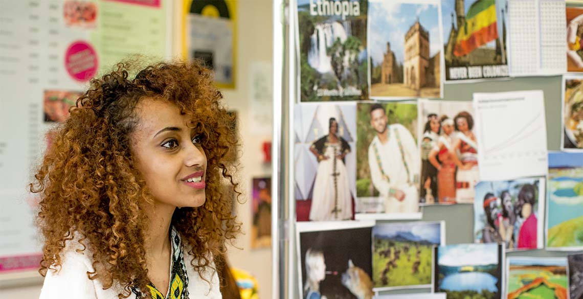 How to choose a course. Female student next to a collage of photos.