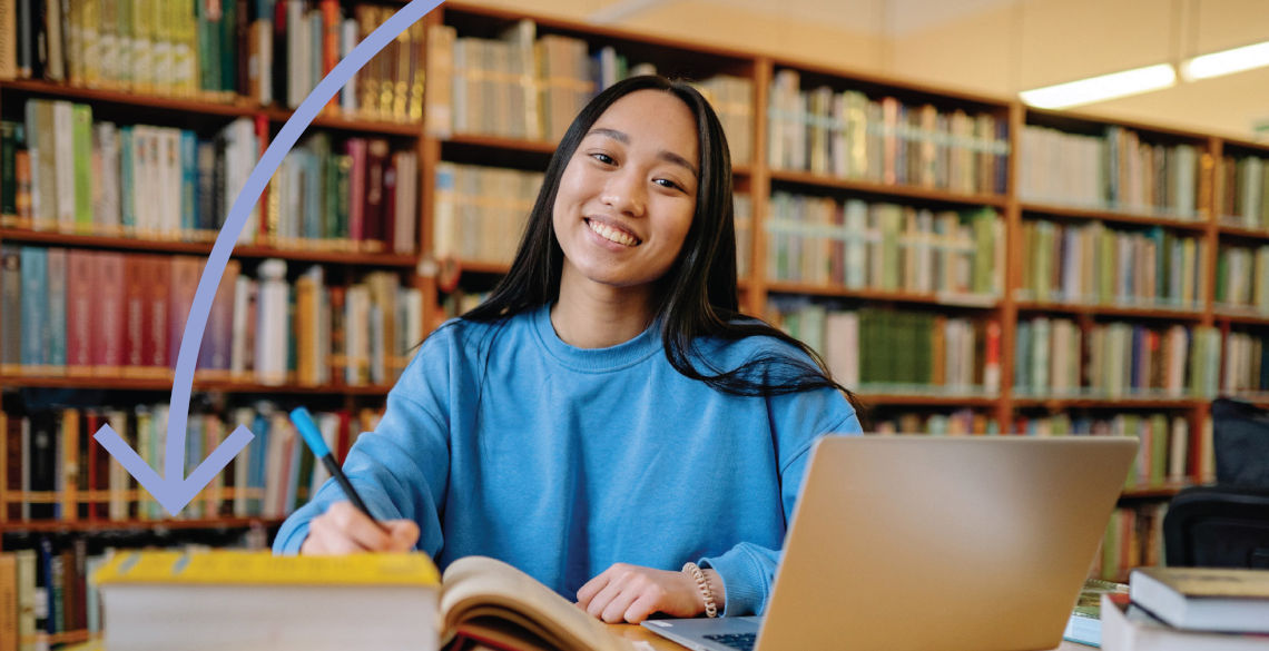 Smiling Student in Library
